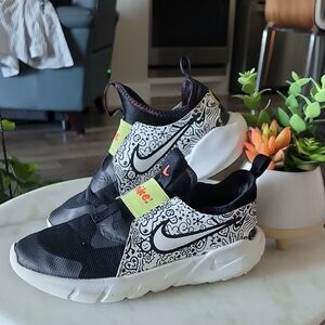 Nike Black and White Sneakers with Slip-On Design